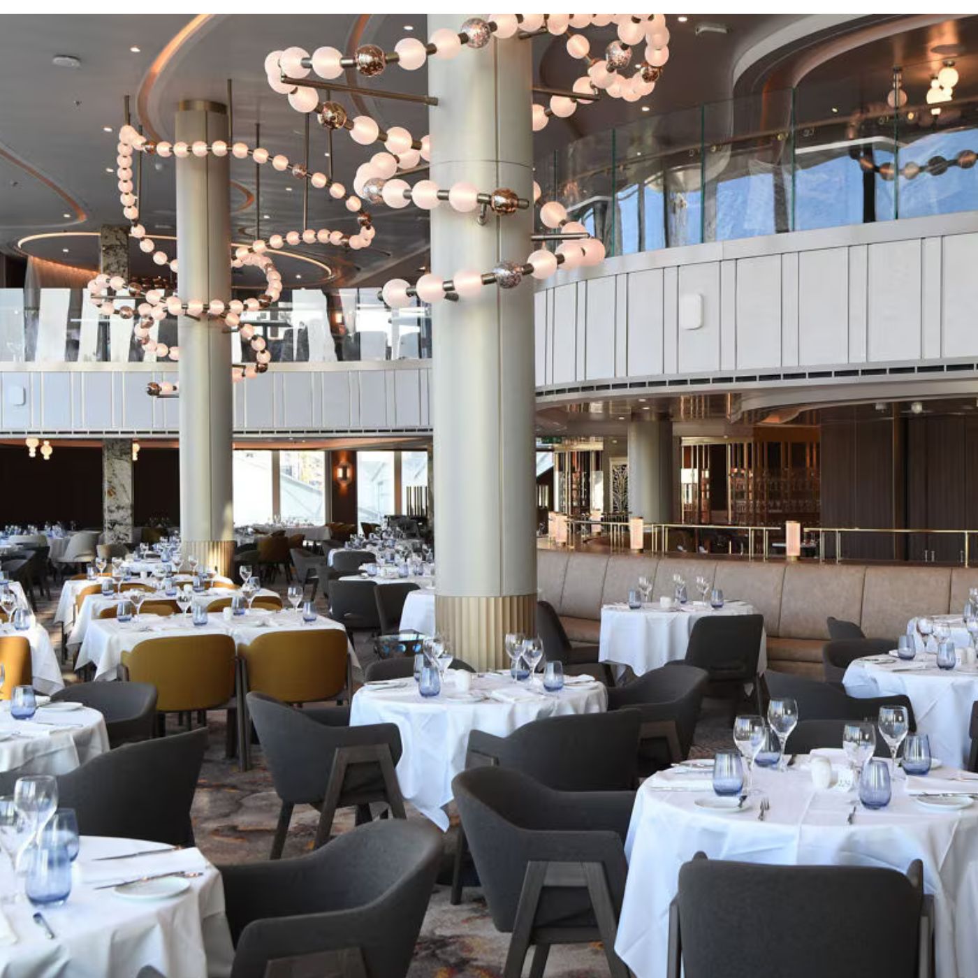 Elegant dining room aboard the Founding Voyage ship